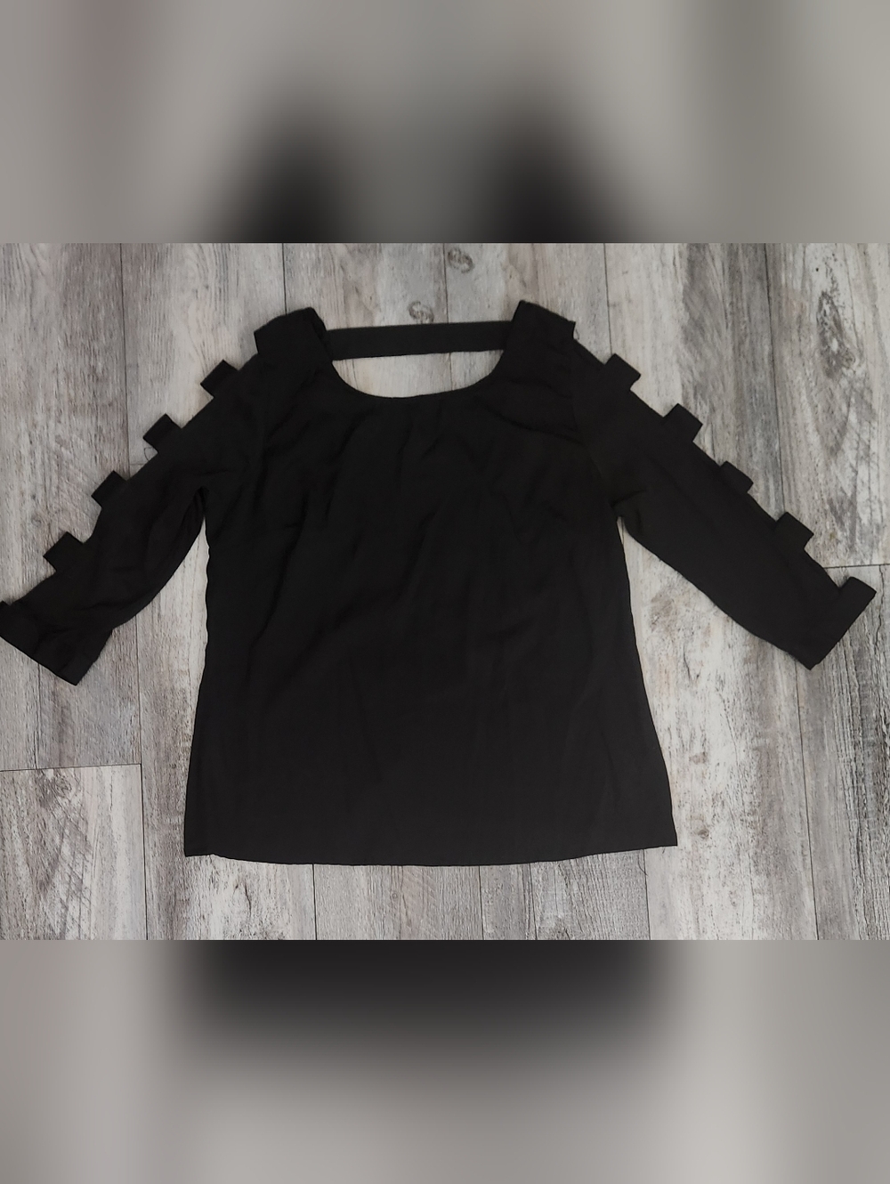 Cold-Shoulder Black Blouse with Ladder Sleeve Detail